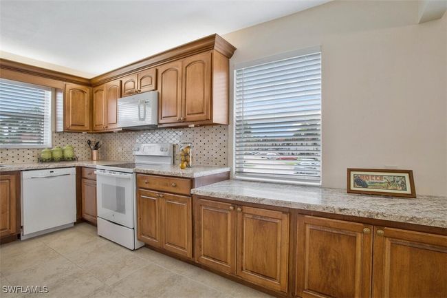 great views from both kitchen windows | Image 17