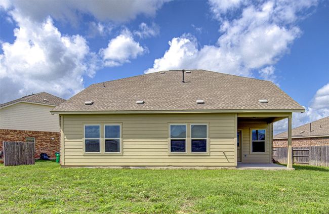 Back of house featuring a patio and roof with shingles | Image 31