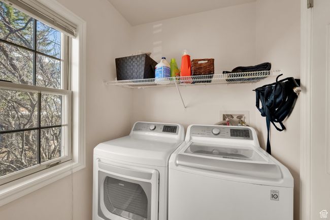 Laundry room with washing machine and dryer and laundry area | Image 12
