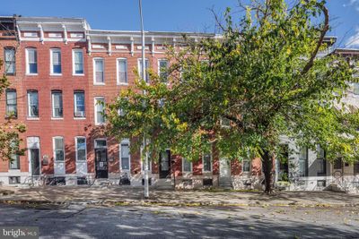 1823 N Caroline Street, Townhouse with 5 bedrooms, 3 bathrooms and null parking in BALTIMORE MD | Image 1