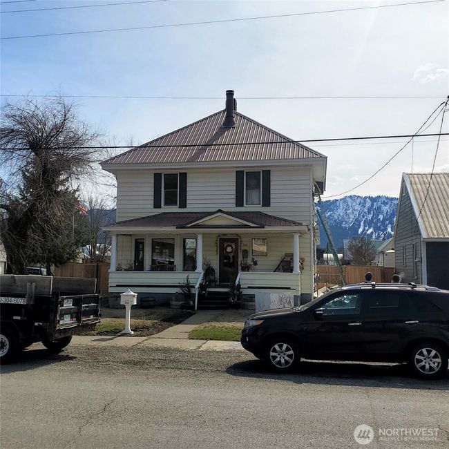 This is a photo of the home at the beginning of the process. Note the vinyl siding. | Image 35