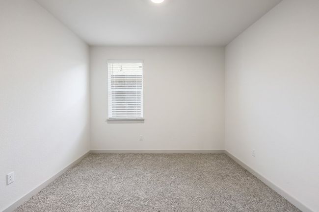 Bedroom with carpet | Image 16