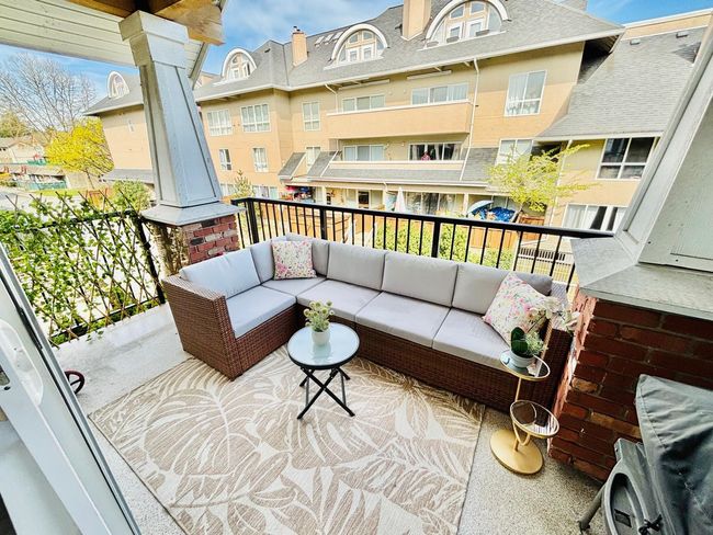 Balcony featuring an outdoor hangout area | Image 10