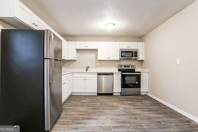 8621 Chestnut Ln, House other with 3 bedrooms, 2 bathrooms and null parking in Lithia Springs GA | Image 7
