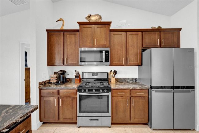 9750 Pepper Tree Pl, House other with 4 bedrooms, 2 bathrooms and null parking in WILDWOOD FL | Image 14