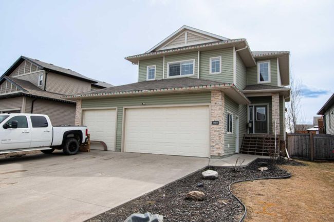 10217 125 Avenue, Home with 4 bedrooms, 3 bathrooms and 6 parking in Grande Prairie AB | Image 1