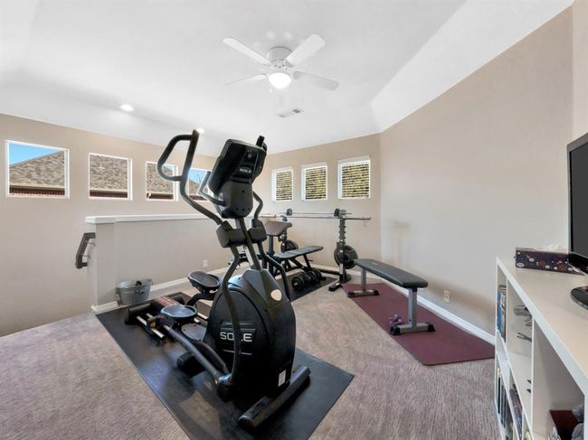 Den is being used as exercise room STAIR access to kitchen from here as well | Image 39