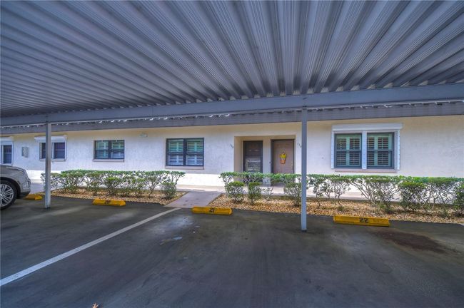 Carport 21, right in front of the unit door | Image 42