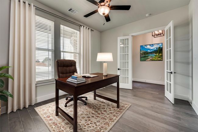 Office featuring french doors, baseboards, and dark wood finished floors | Image 27
