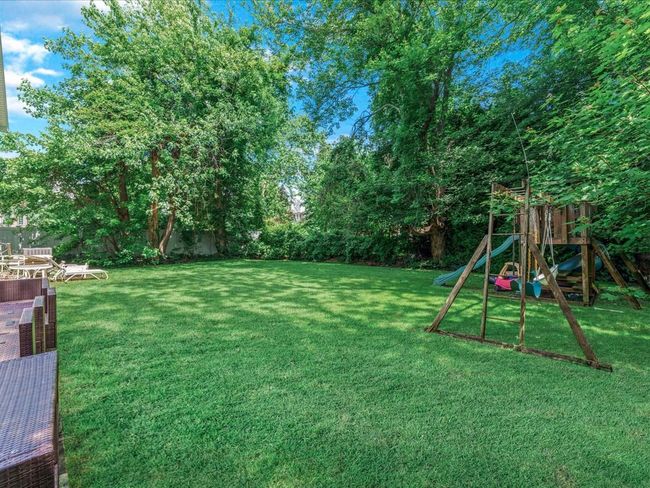View of yard with a playground | Image 27