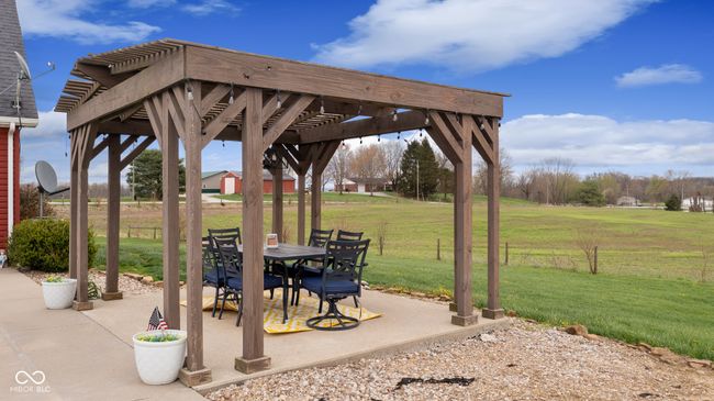 view of patio / terrace with a pergola and outdoor dining area | Image 42