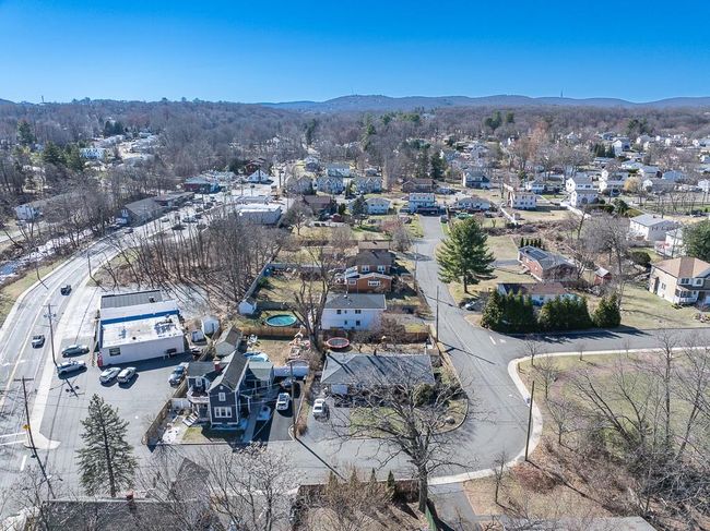 Birds eye view of property featuring a mountain view and a residential view | Image 42