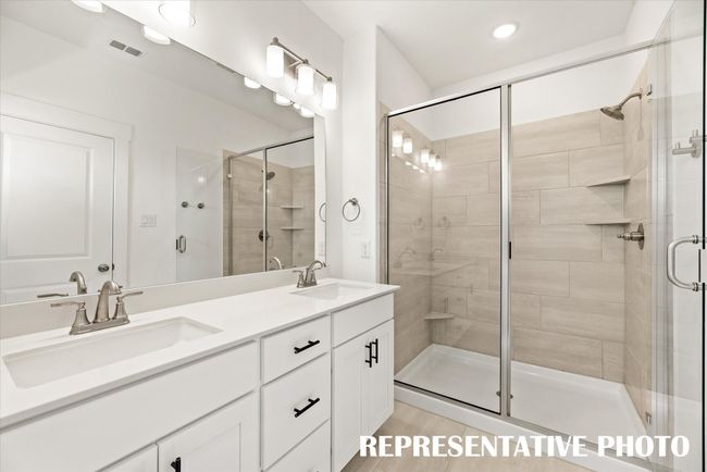 You'll never want to leave the oversized walk in shower in your new owner's bath! REPRESENTATIVE PHOTO | Image 12