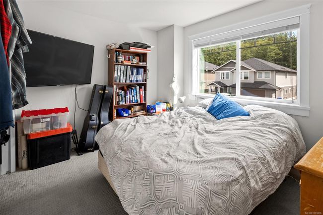 View of carpeted bedroom | Image 45