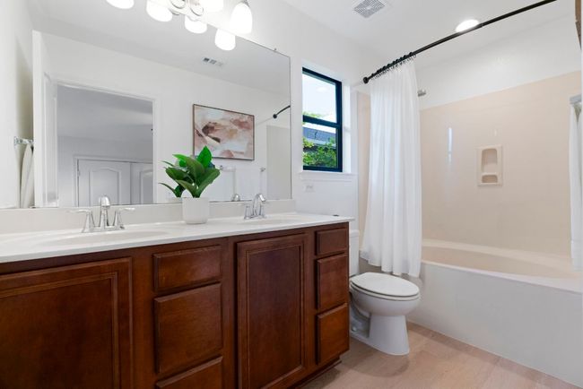 The primary ensuite combines practicality with a touch of style, providing a space that is both functional and stylish. | Image 14