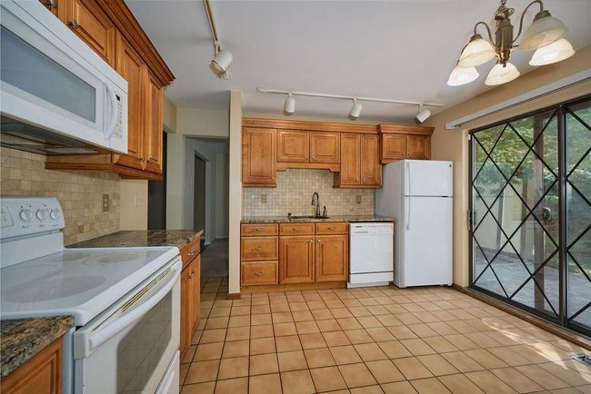 Kitchen featuring white appliances | Image 7