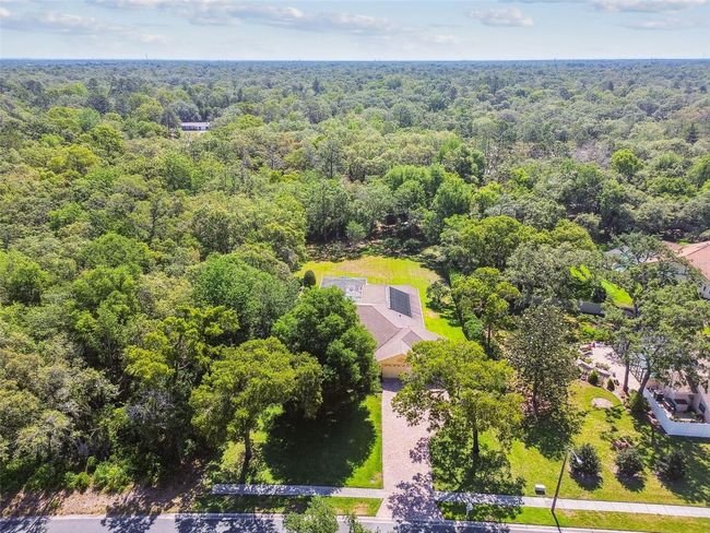 18502 Winding Oaks Blvd, House other with 4 bedrooms, 3 bathrooms and null parking in Hudson FL | Image 76