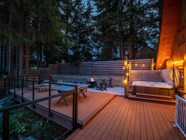 Deck featuring an outdoor fire pit | Image 31