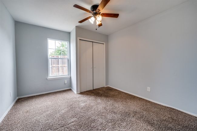 Unfurnished bedroom featuring carpet, a closet, and ceiling​​‌​​​​‌​​‌‌​‌‌​​​‌‌​​‌‌​‌​​​​​‌ fan | Image 11
