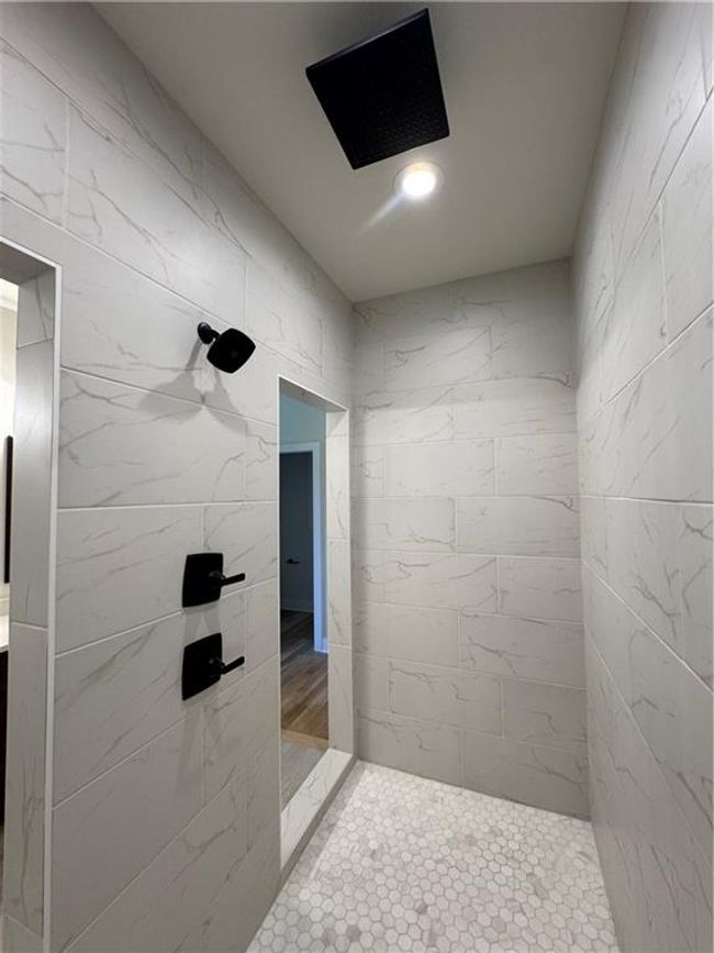 Full bath with a tile shower | Image 34