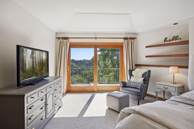 Sprawling primary suite with private balcony | Image 32