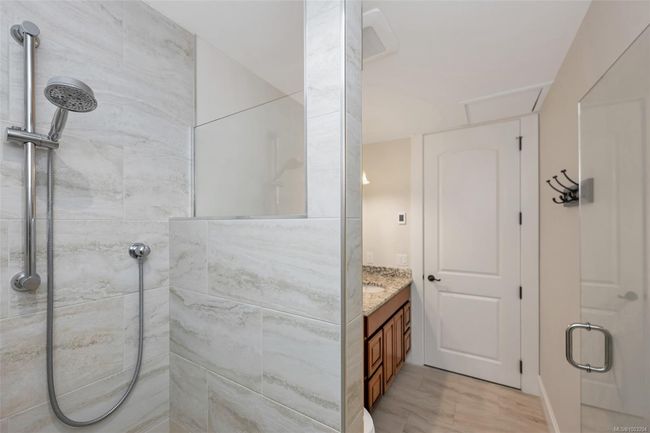 Full bathroom with a shower stall and vanity | Image 62