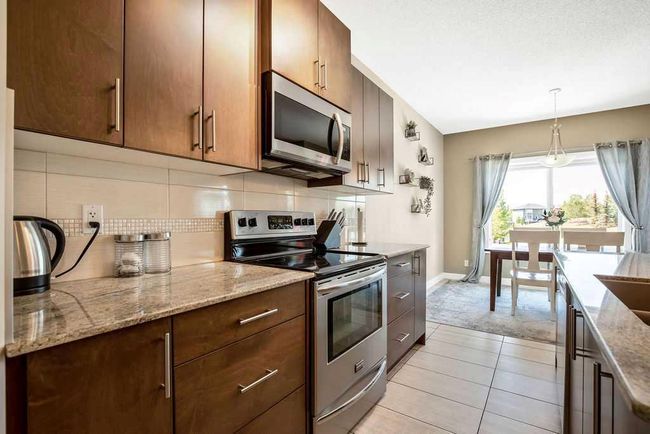 5 Drake Landing Loop, House detached with 3 bedrooms, 2 bathrooms and 5 parking in Okotoks AB | Image 11