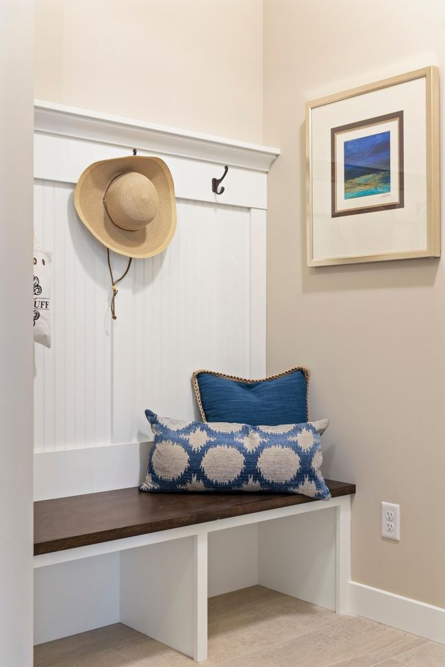 Built-in mudroom bench and large closet off the mudroom. Adjacent to separate Laundry room & is connected to the Owner's bedroom closet! Photos may not depict actual home plan. Features/materials/finishes shown contain options that are not included. | Image 9