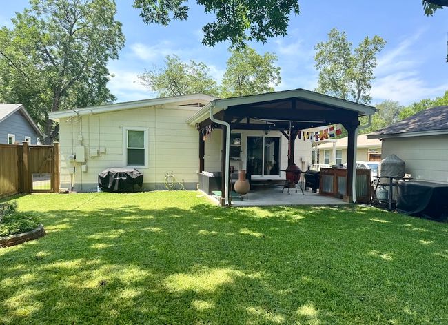 Lush backyard has plenty of shade. | Image 19