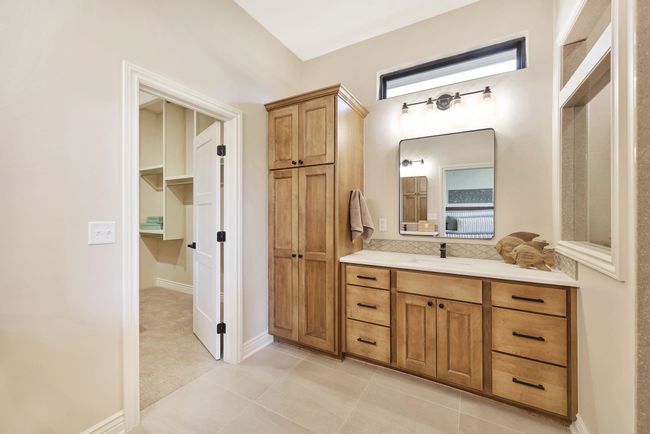 Bathroom with vanity and tile patterned flooring | Image 25