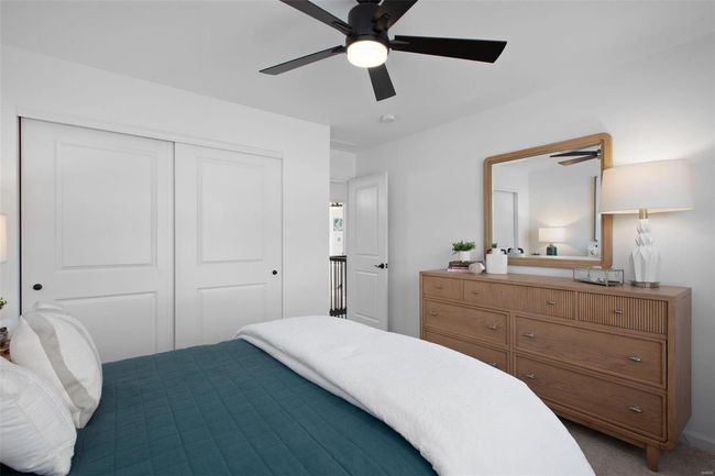 Bedroom featuring carpet, ceiling fan, and a closet | Image 19