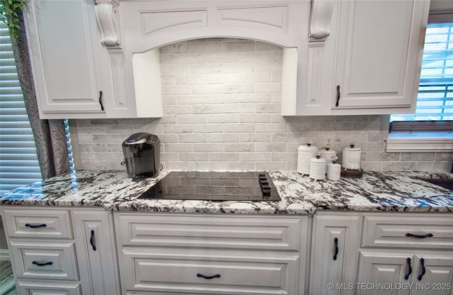 Custom kitchen cabinets with built in appliances. | Image 16