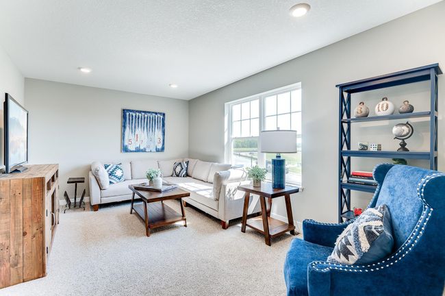 Another view point of upstairs loft, showing how truly spacious it is. Photo of model home, color and options will vary. | Image 23