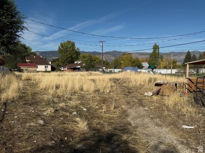 View of yard with a mountain view | Image 1