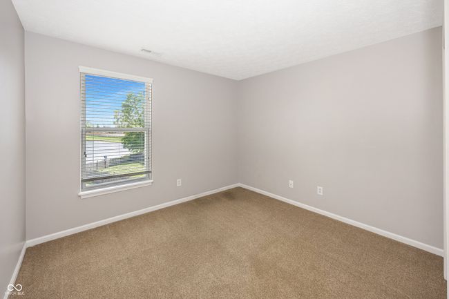Bedroom with pond view | Image 39