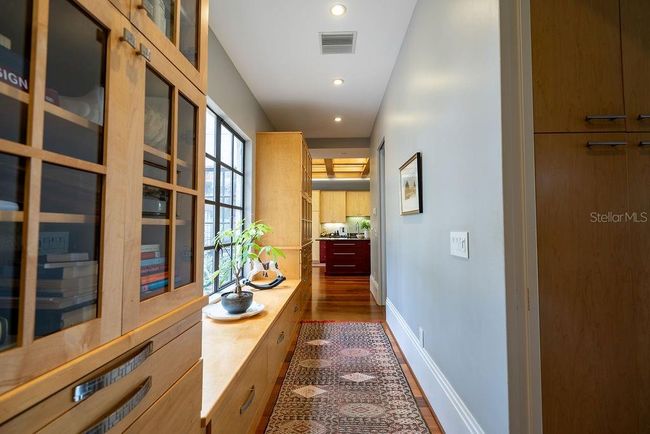 Main laundry room off garage hallway. all the rooms off the hallway have heafty pocket doors. | Image 52