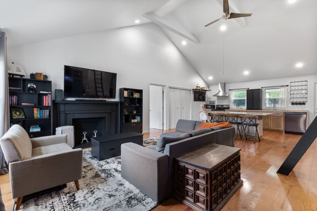 Entering from the front door into the impressive great room with a 15ft ceiling. | Image 14