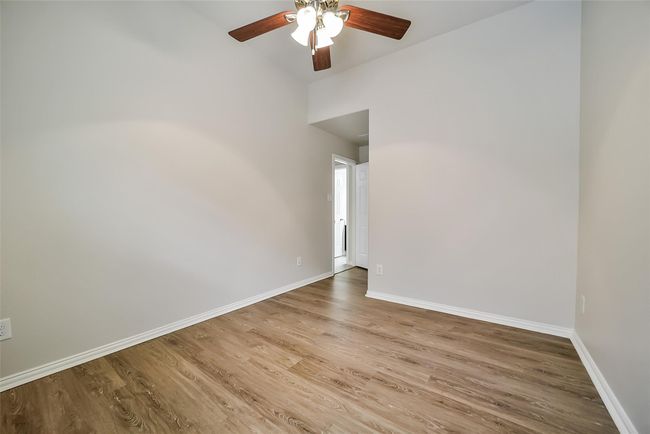 The larger of the two secondary bedrooms, this room has more of the LVP that makes allergies non-existent and clean-up a breeze. | Image 24