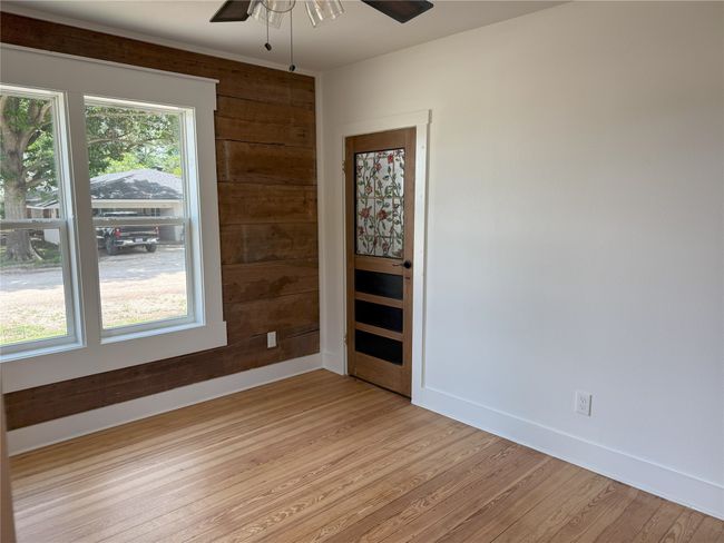 Spare room featuring a ceiling fan and light wood-style flooring | Image 28