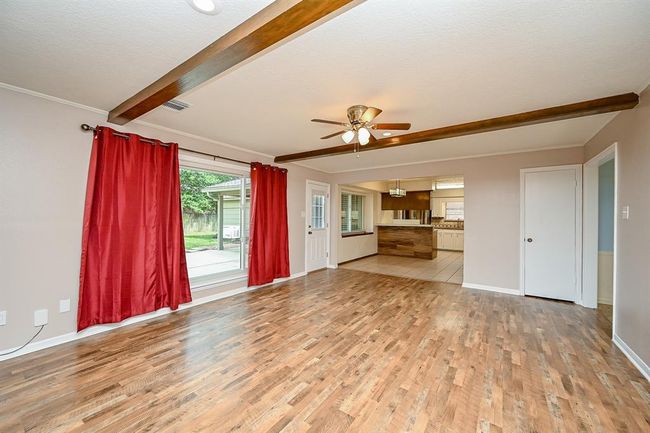 Enjoy the view of the spacious backyard from the newly installed windows. | Image 17