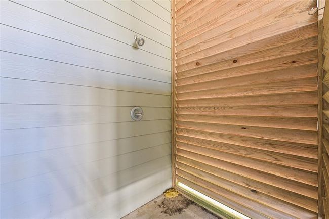 Outdoor shower, perfect for refreshing after a day at the beach. | Image 28