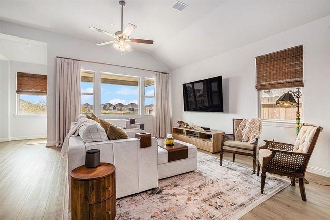 The picture window is the focal point of the entire living area, with magnificent water views! | Image 6