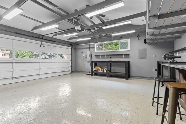 The heated garage extends the living space | Image 13