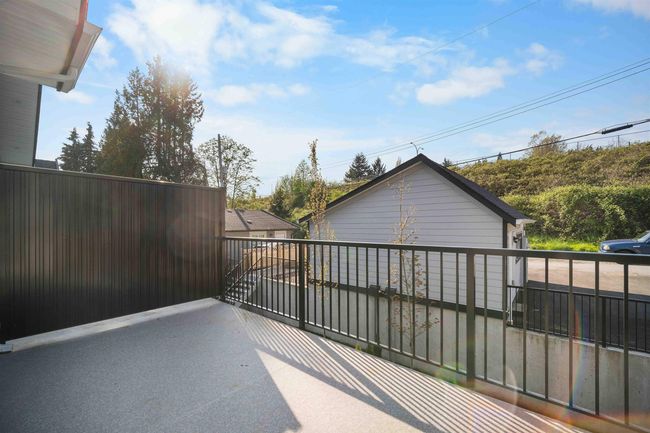 View of patio / terrace featuring a garage | Image 30