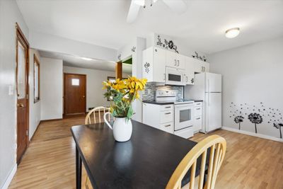 Dining/kitchen area opens to living room | Image 2