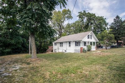 View of front of property featuring a front yard | Image 1