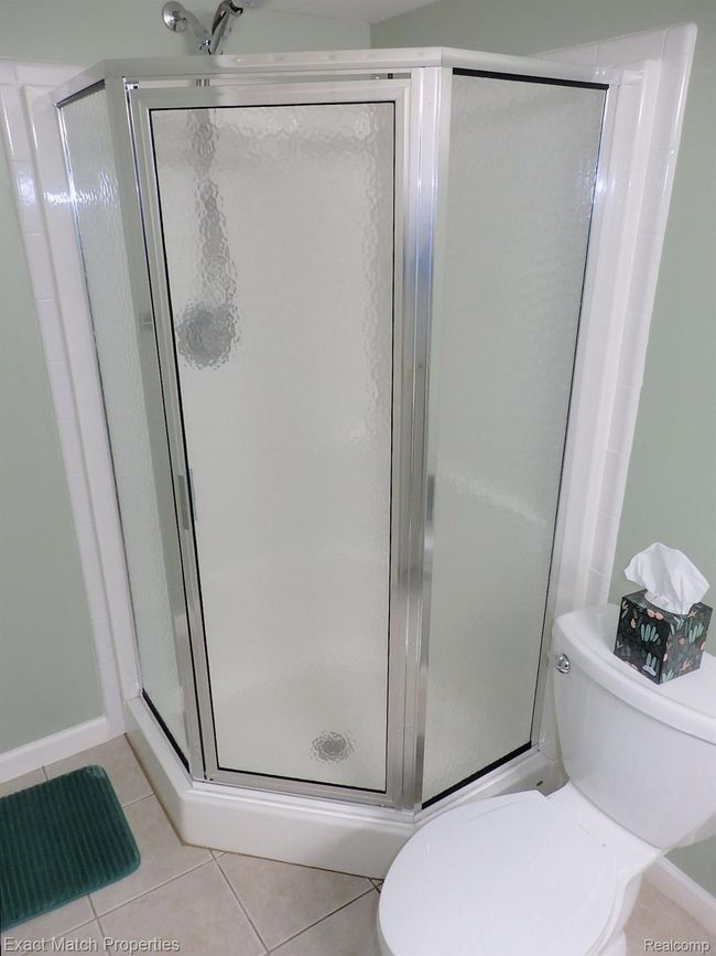 Shower stall in the lower level bathroom | Image 40