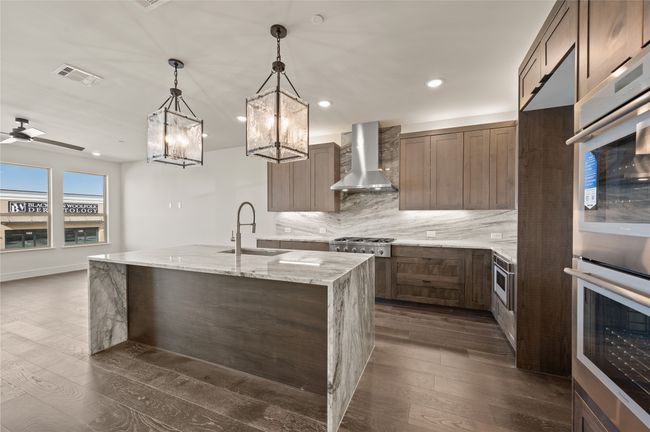 With top of the line finishes throughout, this dream kitchen is everything you have been searching for in your new dream home! | Image 7