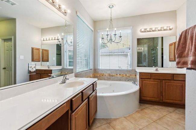 Primary bath with seperate sink areas | Image 25