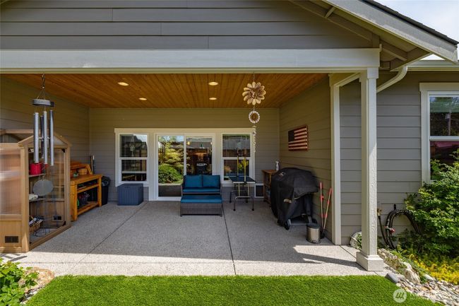 The covered patio is great for year round patio furniture no storing of furniture. | Image 28